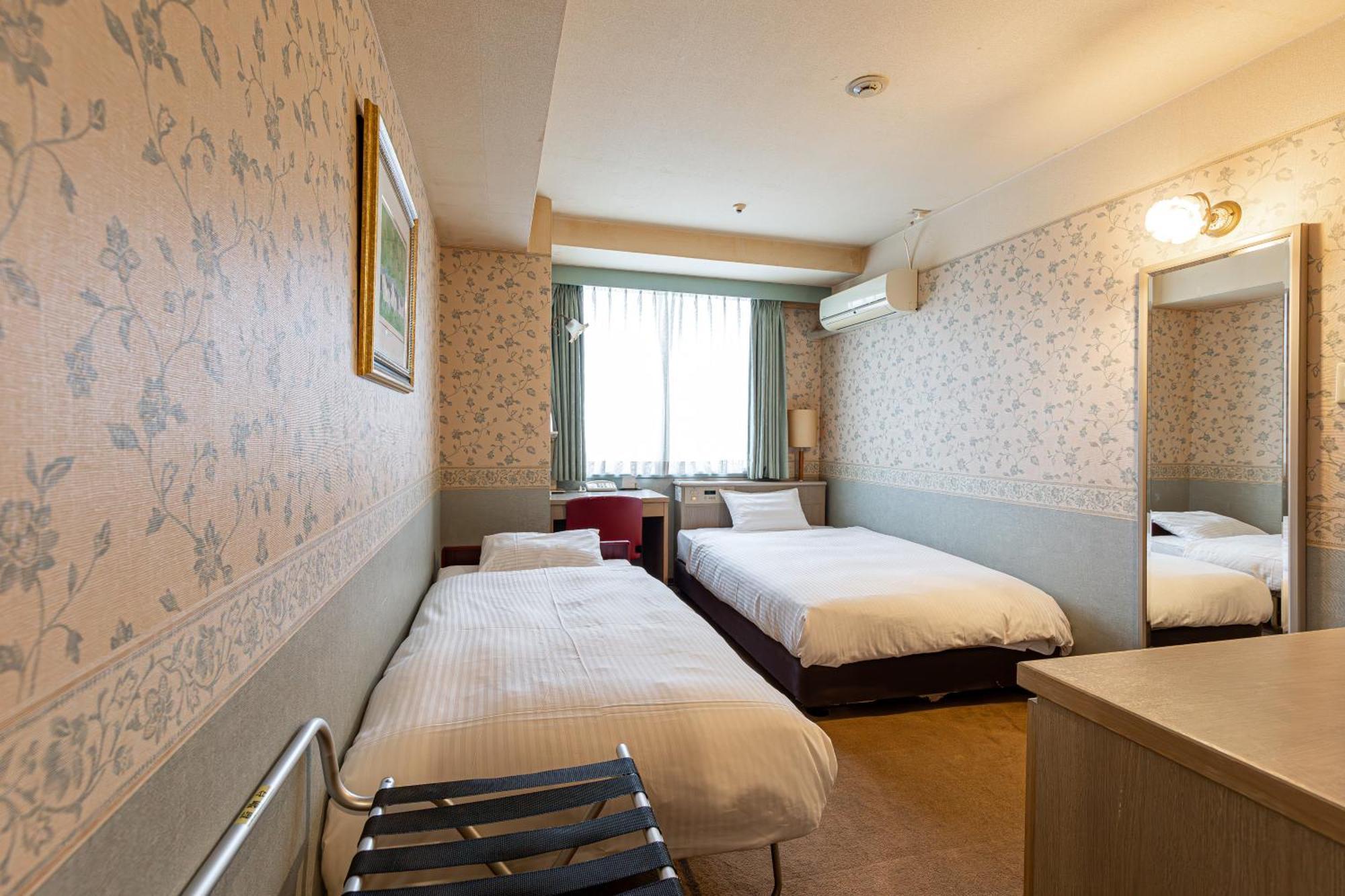 New Sunpia Tsuruga Hotel Buitenkant foto